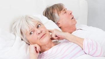 Woman getting disturbed while sleeping